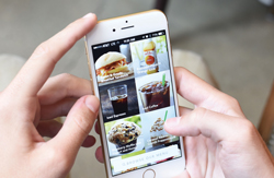 Smartphone being used to order food