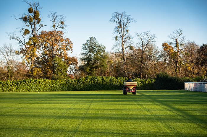 Groundsman working on a pitch