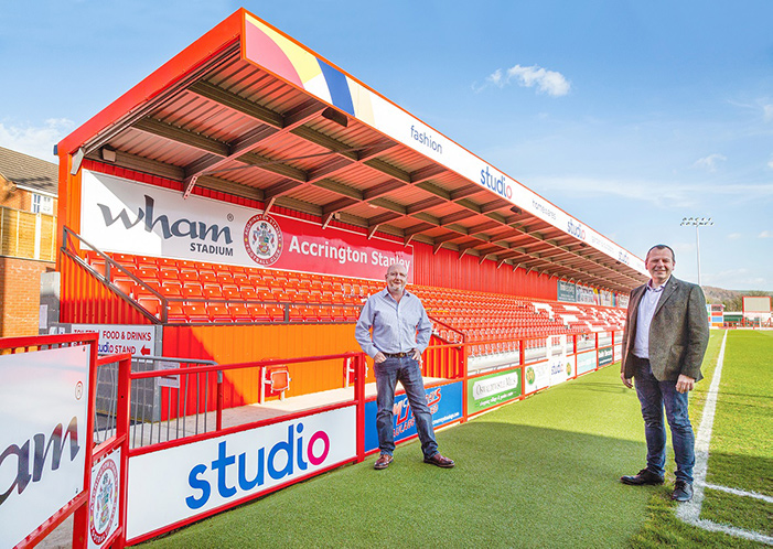 Andy Holt of ASFC and Paul Kendrick of Studio Retail Ltd at the Family Stand at Accrington Stanley FC.