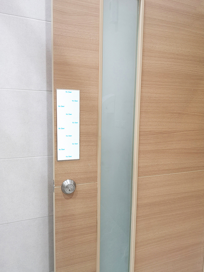 A door with anti-bacterial Visuclean vinyl pannel
