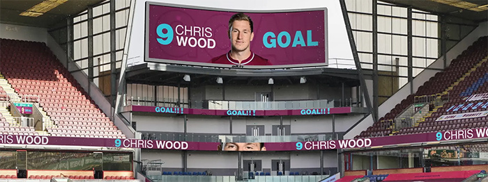 Artist's impression of digital sign showing player Chris Wood has scored a goal