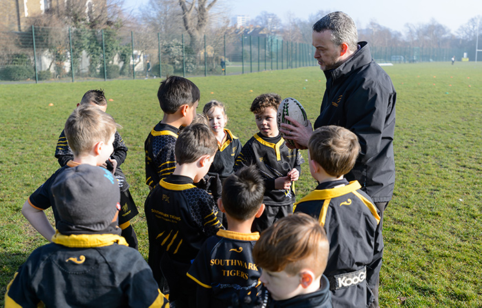 A coach with a child's rugby team