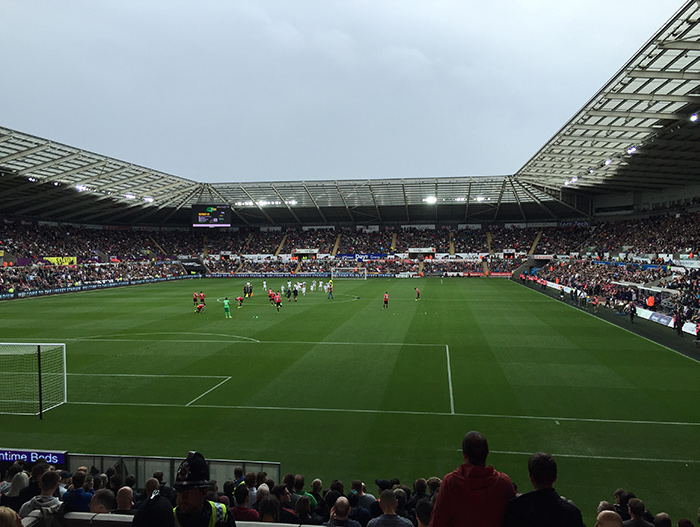 Manchester United playing Swansea at Swansea's home ground