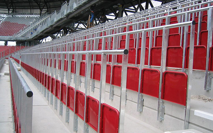Red rail seating in a football stadium