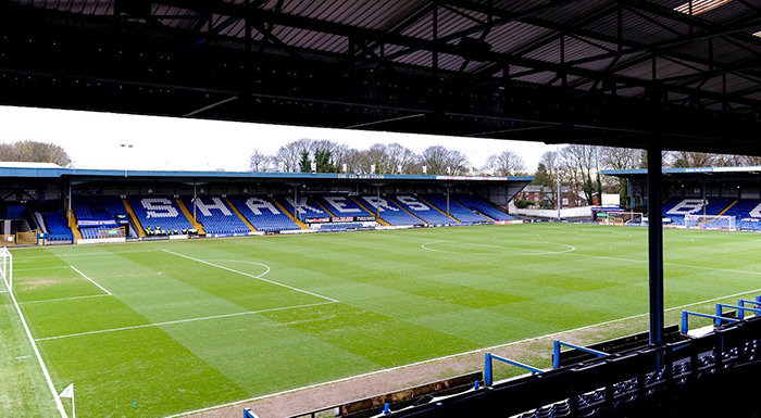 The pitch and stands inside Bury FC's Gigg Lane stadium