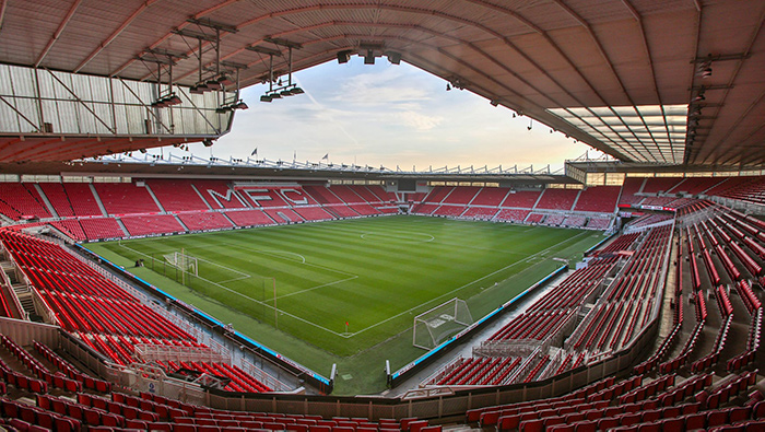 Inside Middlesbrough FC's Riverside Stadium, viewing the football pitch and seating