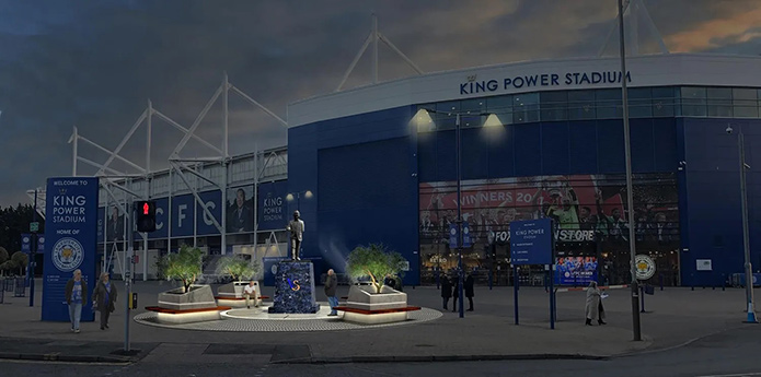 The Khun Vichai statue at King Power Stadium, visible by night