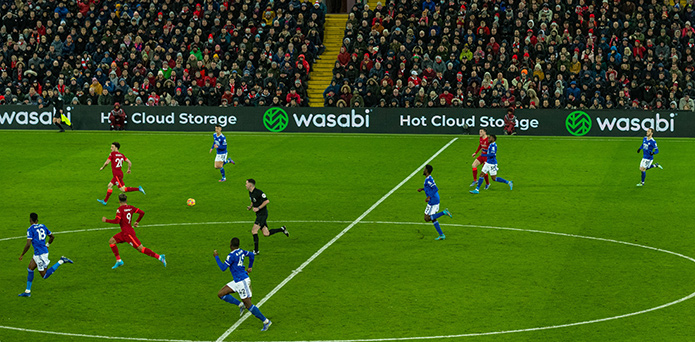 Wasabi Technologies advertising banners at a Liverpool Football match