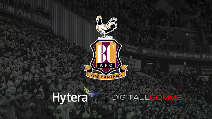Hytera and Digitall Comms logos superimposed over a crowd of supporters at Bradford City Football Club
