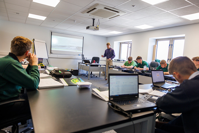 Students study at the John Deere Training Centre when they are not working in a dealership.