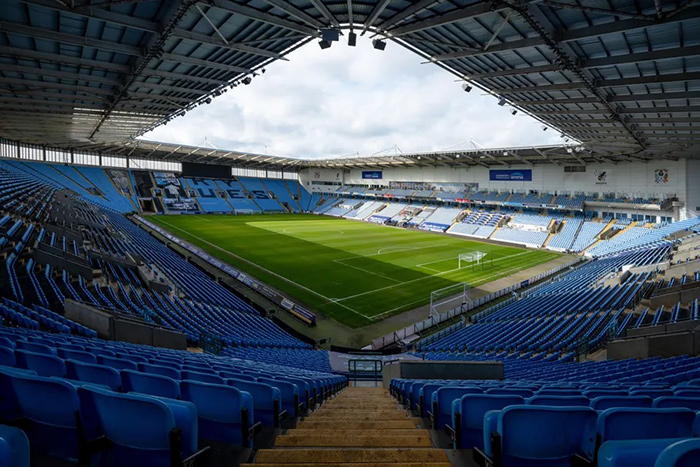 Inside the Coventry Building Society Arena, looking at the football pitch and seating