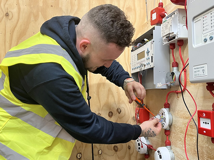 A Fire, Emergency and Security Systems apprentice