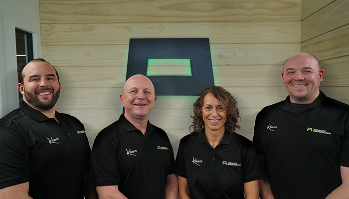 Absolute Performance management team, left to right: Harry Tafota-Nash, Managing Director; Tony Buchanan, Owner; Siân Buchanan, Owner; and Alistair Rosier, Head of Sales and Marketing
