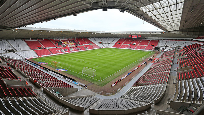A view of the football pitch and seating inside Sunderland AFC's stadium
