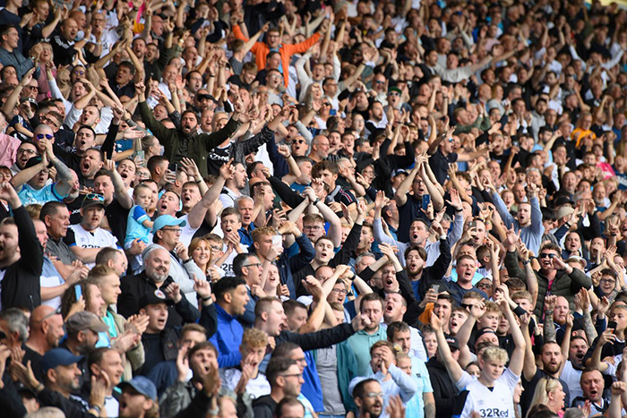 Derby County football fans cheering at a match