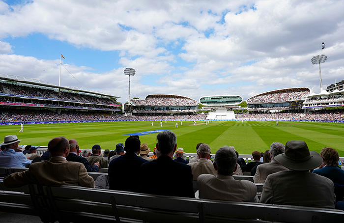 Spectators watching a cricket match at Lord's Cricket Ground