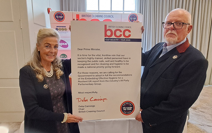 BCC Chair Delia Cannings and Company Secretary Simon Hollingbery holding an enlarged mock-up of the letter