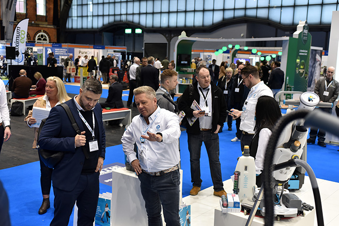 The exhibitors speaking at attendees at the Manchester Cleaning Show