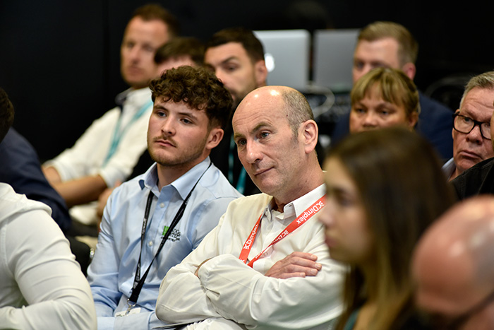 An audience listening to a presentation at InstallerSHOW