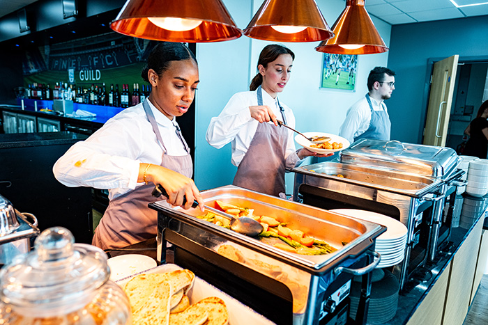 Sodexo Live! catering staff serving food at Preston North End's football stadium