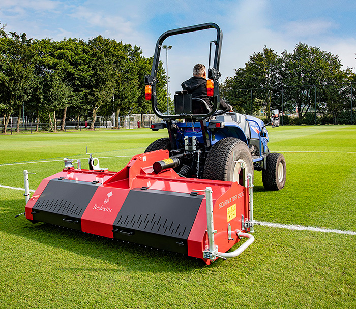 Redexim's Scarivator working on a sport pitch