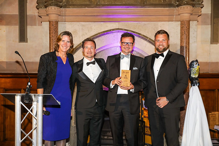 Jonathan Clarke and Tim Williams, Oxford United Managing Director, receiving the award