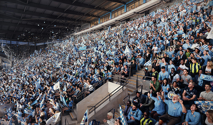 Fans cheering at Manchester City's North Stand expansion