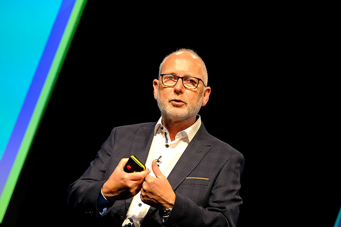 Peter Molloy speaking at a conference