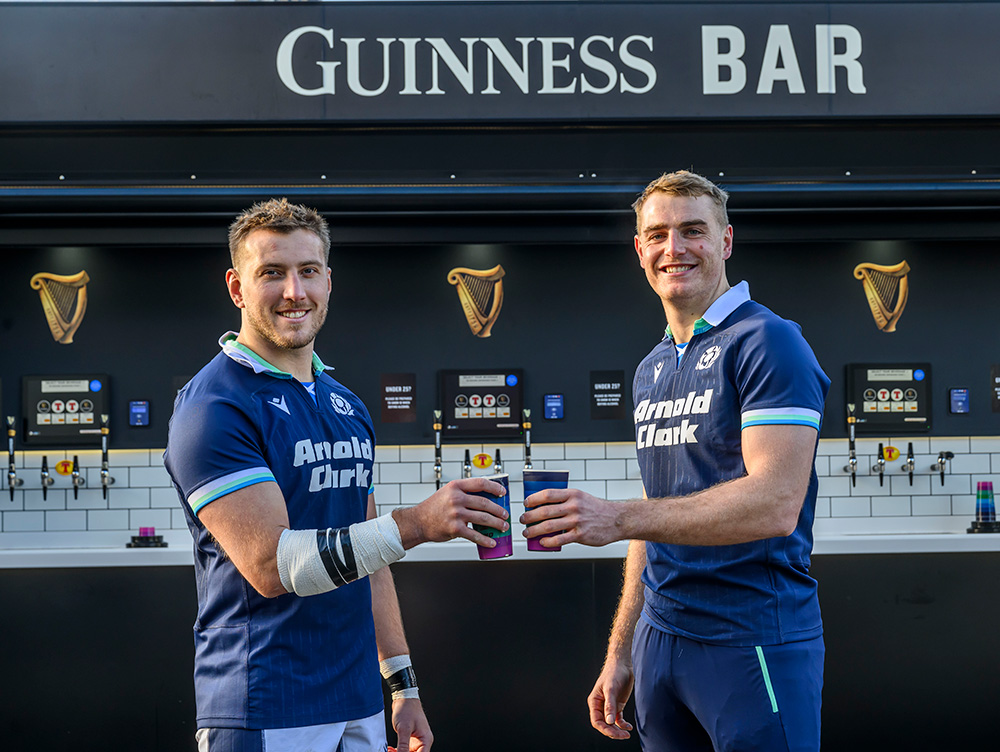 Two Players enjoying a drink from the self-serve bar at The Murrayfield Experience